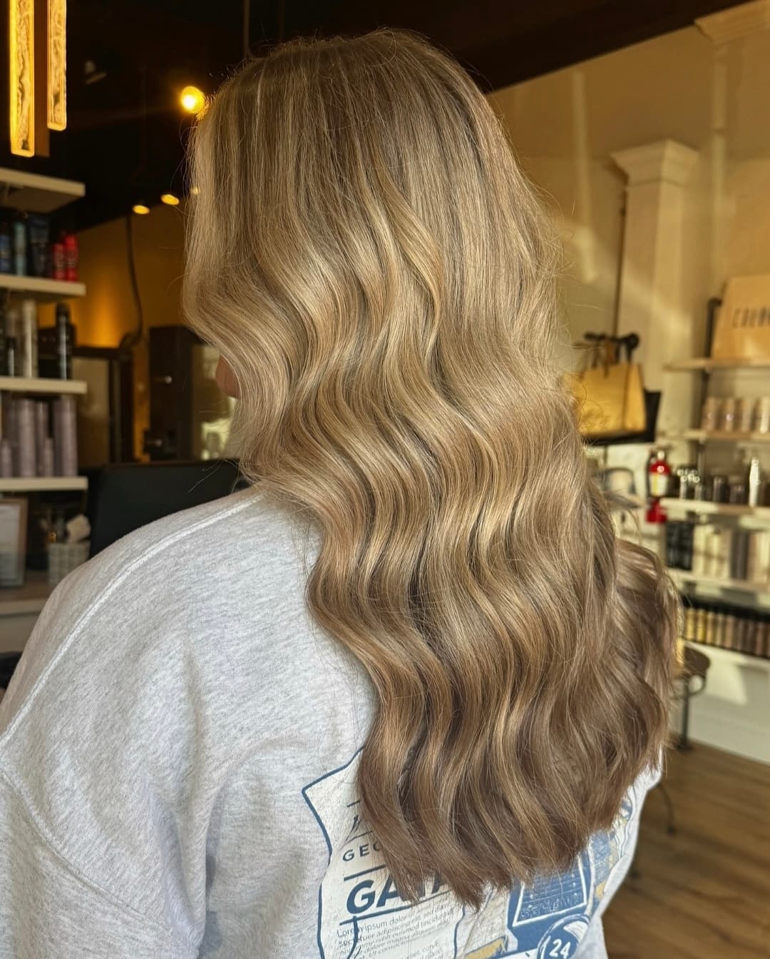 Precision haircut shaped around the client's face — hair by Lili Barker in Leander, TX