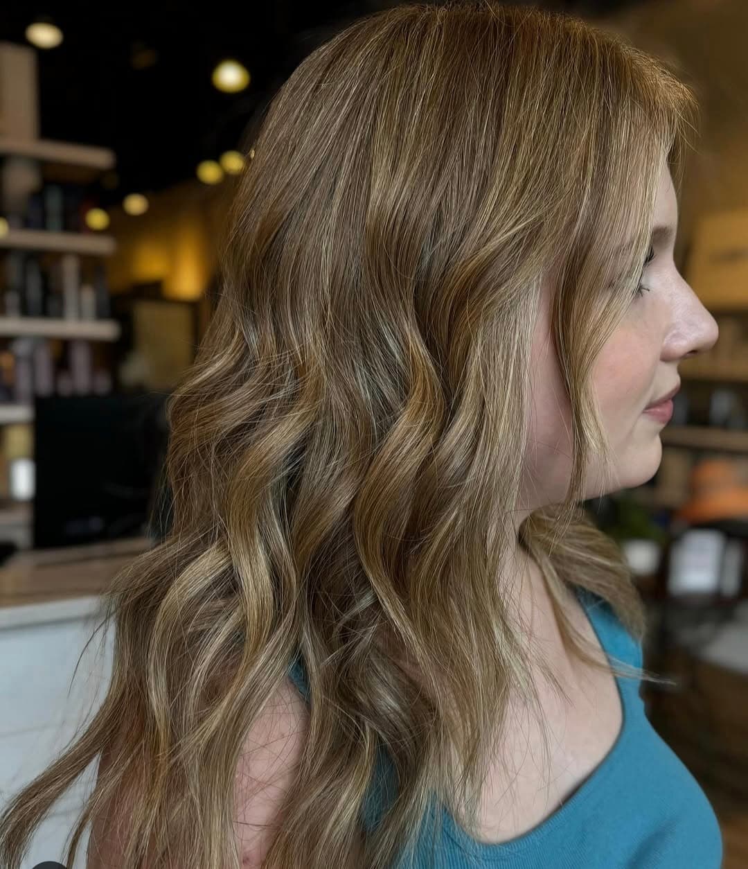 Lived-in brunette color with soft face-framing highlights — hair by Lili Barker in Leander, TX