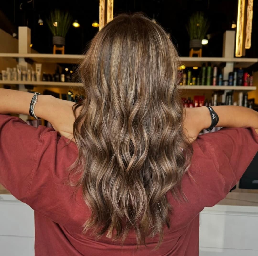 Full highlight and toner, styled in loose waves — hair by Lili Barker in Leander, TX