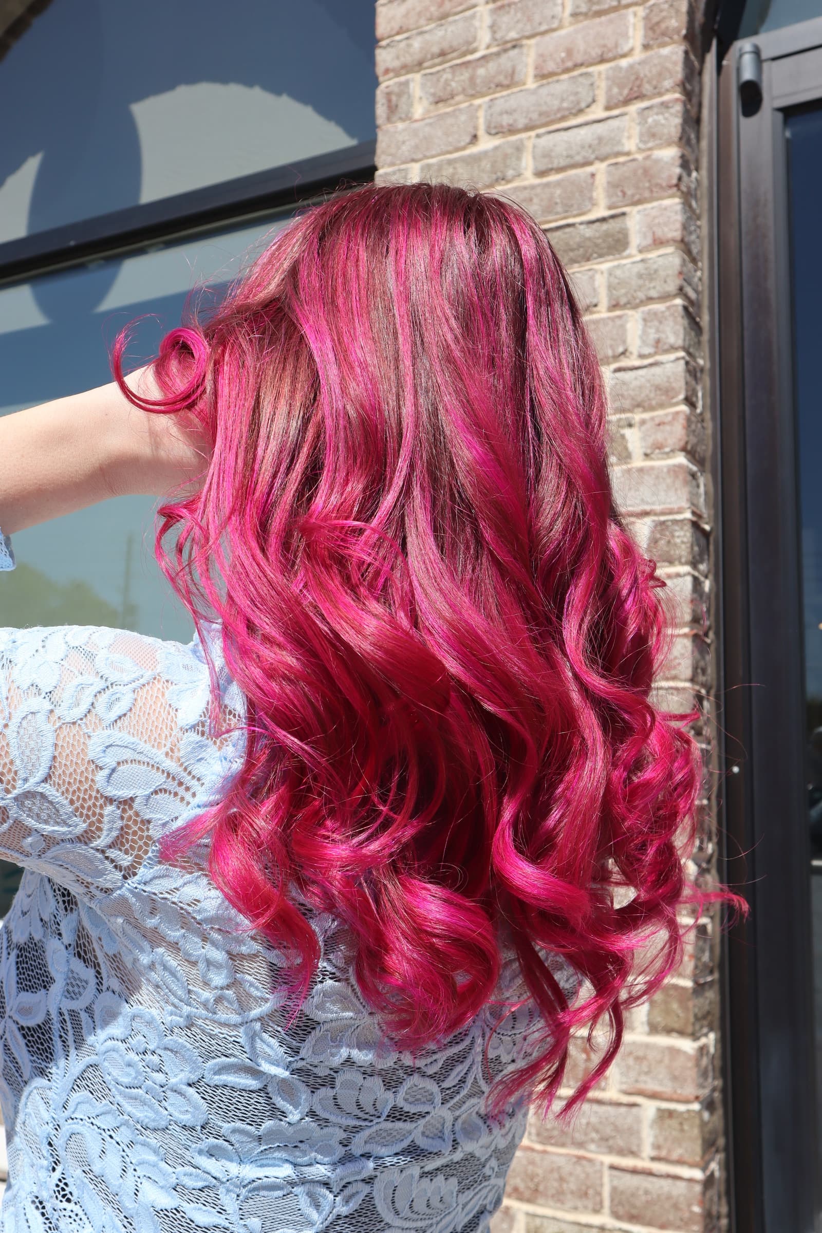 Lived-in brunette color with soft face-framing highlights — hair by Lili Barker in Leander, TX
