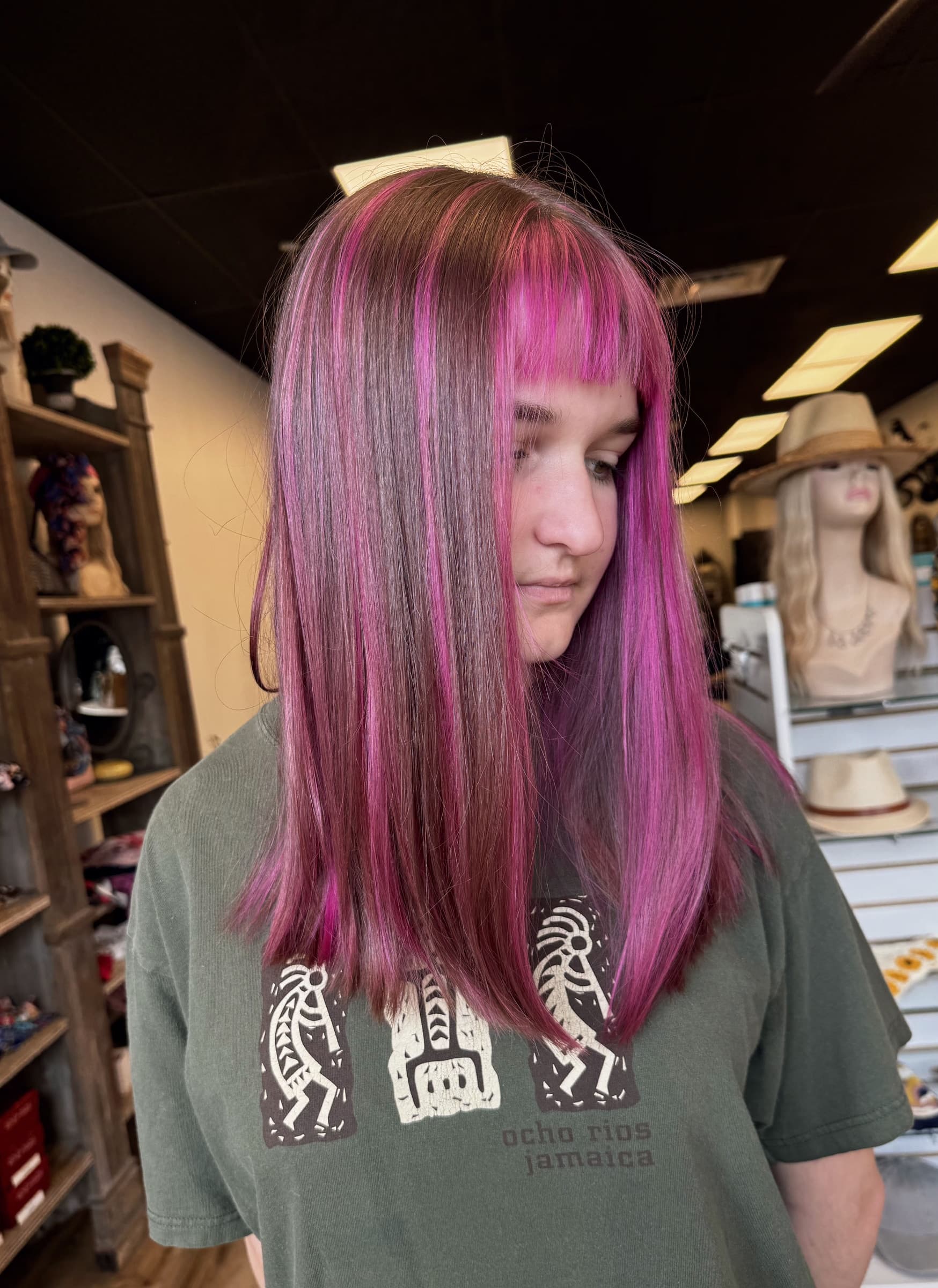 Layered cut with a bouncy blowout finish — hair by Lili Barker in Leander, TX