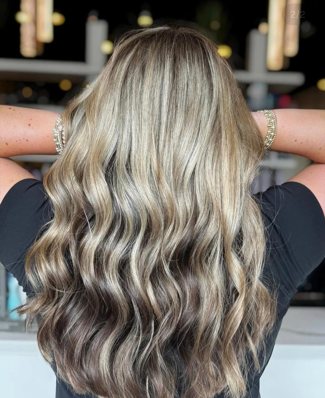 Precision haircut shaped around the client's face — hair by Lili Barker in Leander, TX